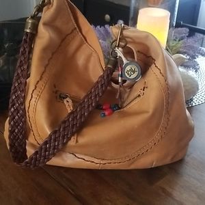 The sak. Camel colored  genuine leather Handbag